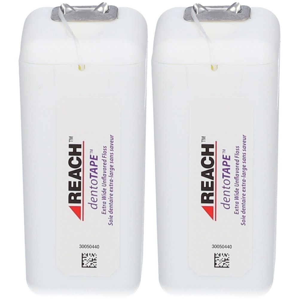 Zwei weiße Behälter mit Zahnseide. Aufschrift: REACH dentoTAPE. Extra Wide Unflavored Floss. Mit Metallverschluss und Etikett.