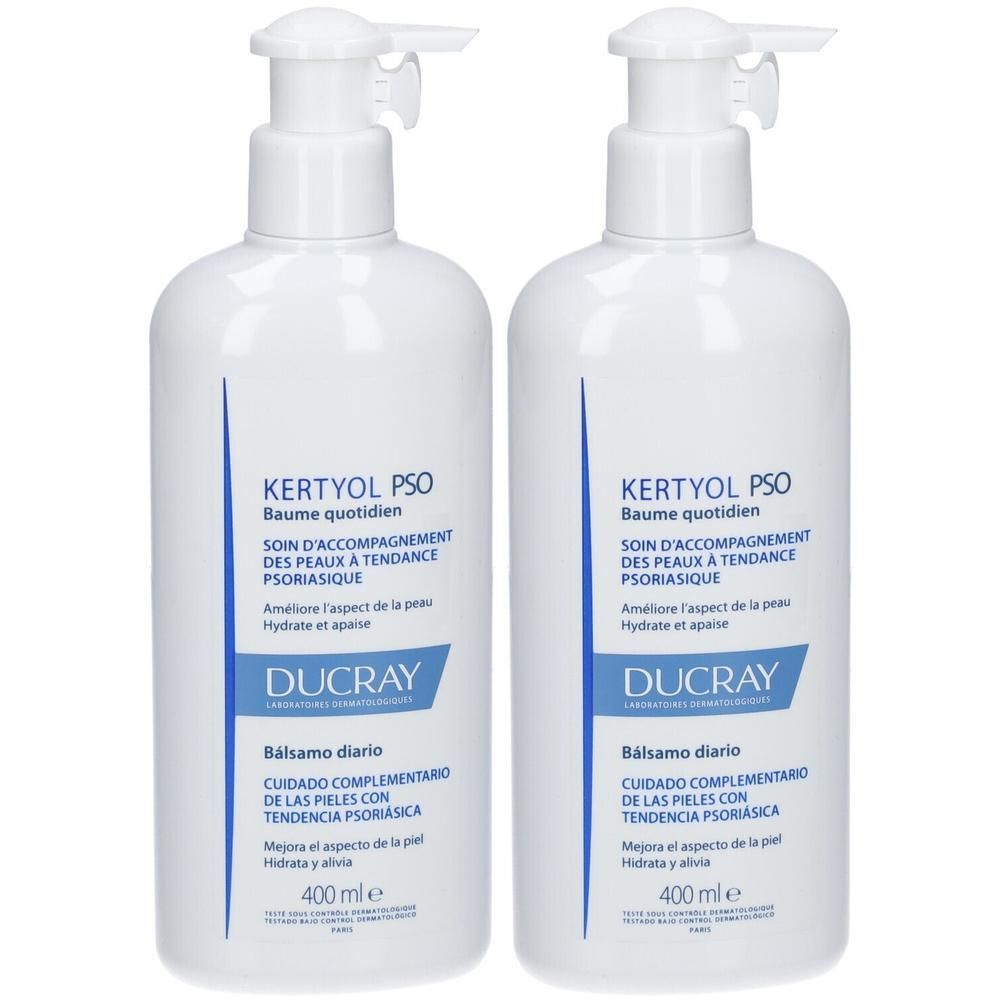 Zwei weiße Flaschen mit Pumpverschluss. Aufschrift: KERTYOL PSO, Baume quotidien, DUCRAY. 400 ml.