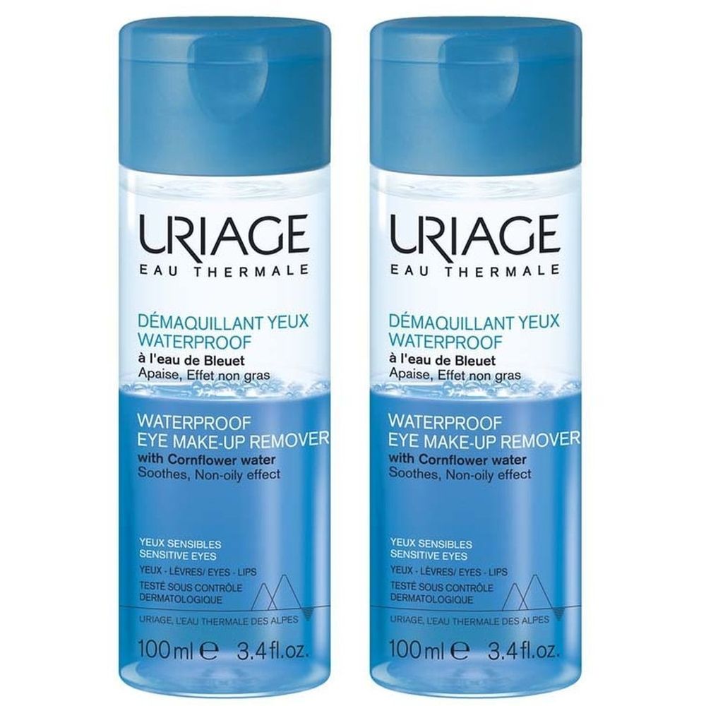 Deux flacons de démaquillant pour les yeux Uriage. Bouchons et étiquettes bleus. Texte : Waterproof Eye Make-up Remover.