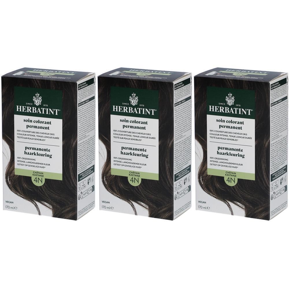 Drei Schachteln Herbatint Pflege Permanent Colorant 4N Kastanienbraun. Grüne und weiße Verpackung mit Produktnamen und Haarfarbe.
