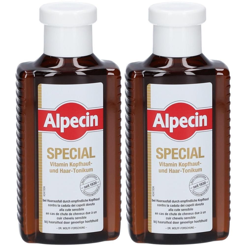 Zwei Flaschen Alpecin Special Vitamin Kopfhaut- und Haar-Tonikum. Braune Flaschen mit weißen Deckeln und Etiketten.