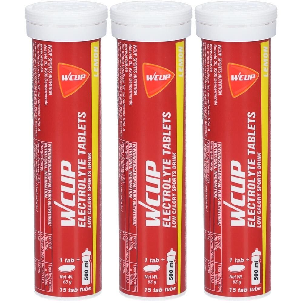 Drei rote Röhren mit weißen Deckeln. Aufschrift: WCUP Elektrolyt-Tabletten. Gelbes Etikett mit Zitronen-Hinweis. 15 Tabletten.