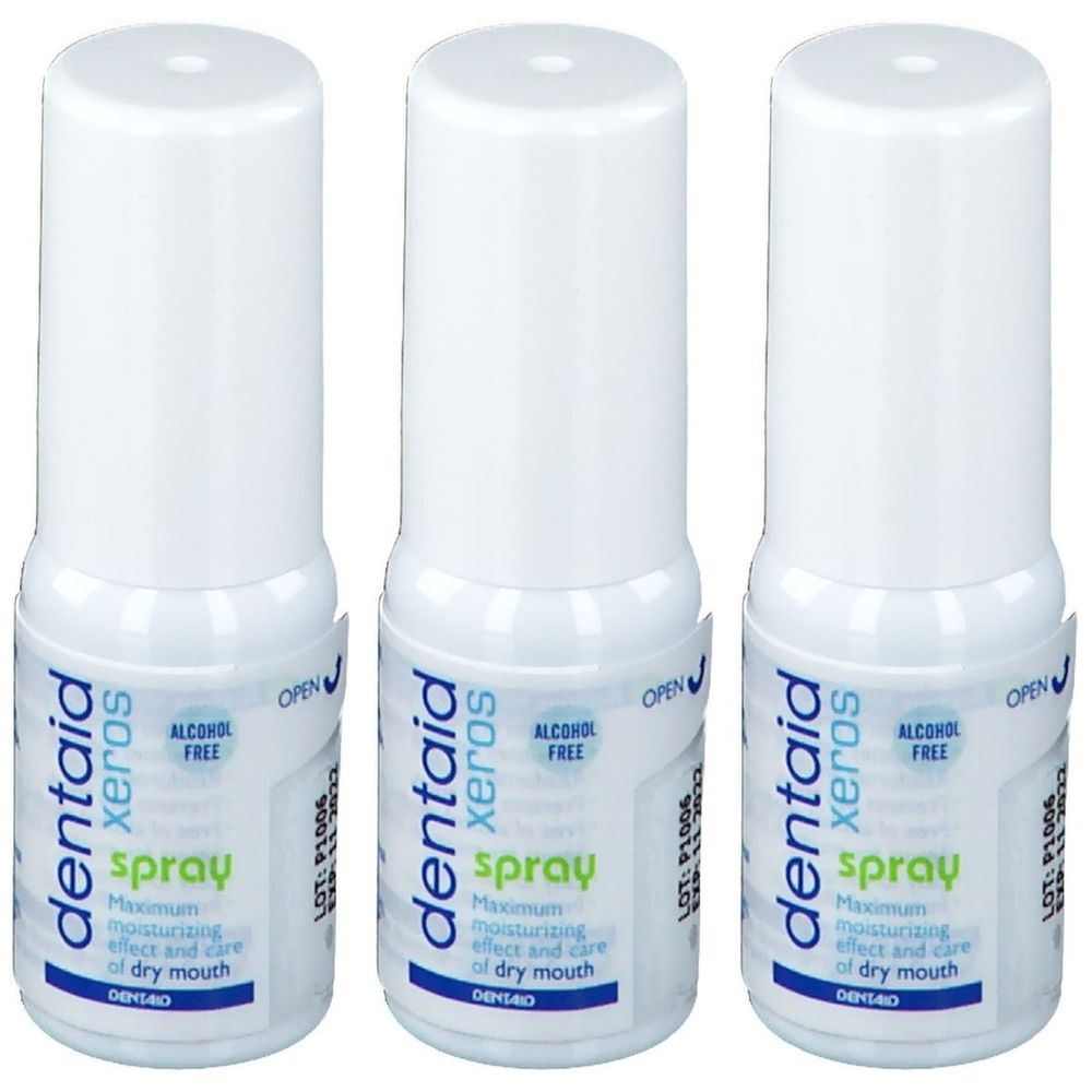 Trois flacons spray blancs. Inscription: Dentaid Xeros spray, sans alcool. Texte bleu et vert.