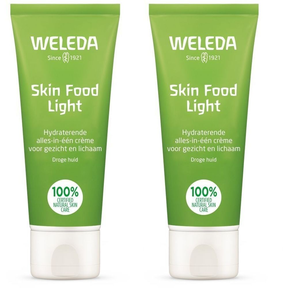 Deux tubes verts « WELEDA Skin Food Light ». Texte : « Hydraterende alles-in-één crème voor gezicht en lichaam ». Label : « 100% Certified Natural Skin Care ».