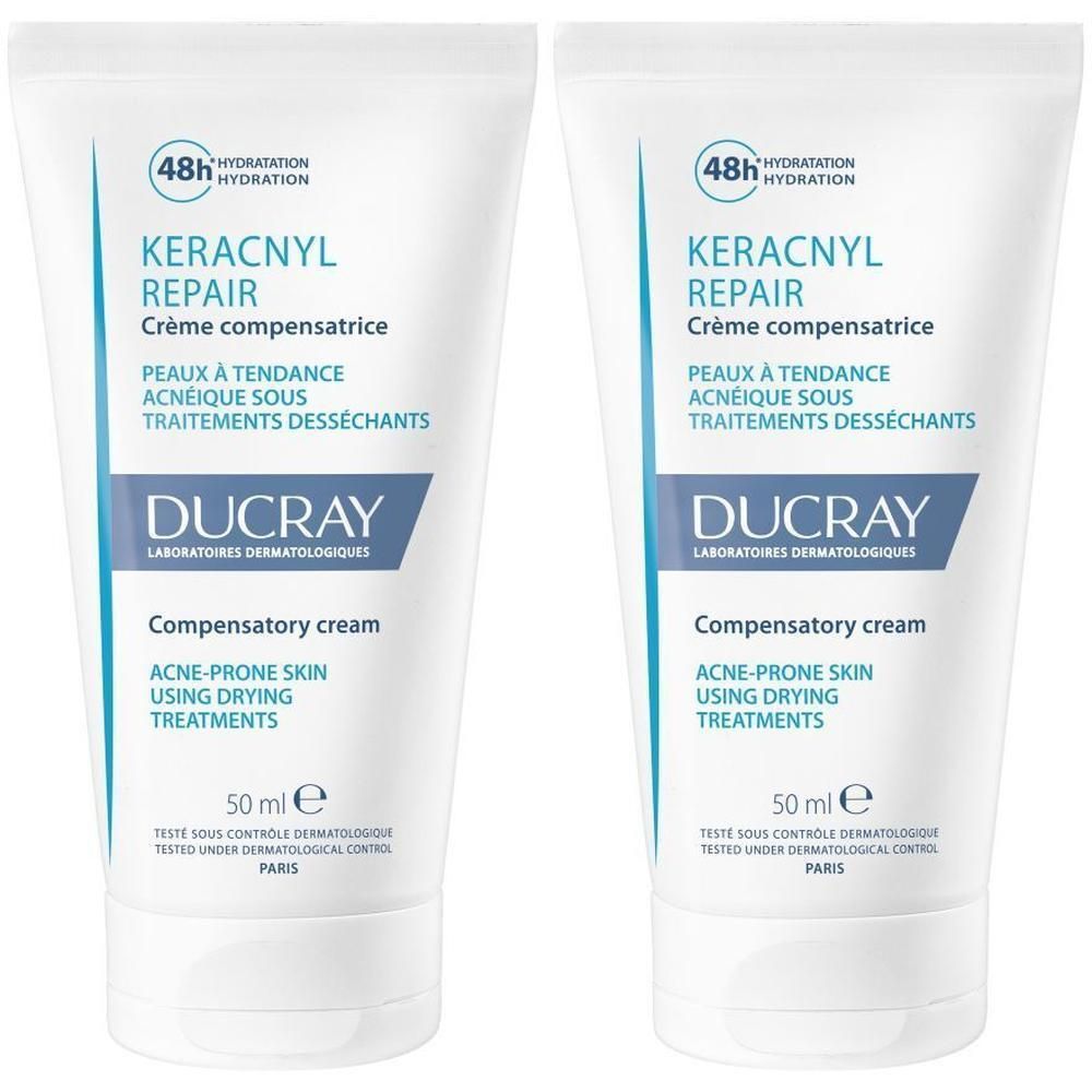Zwei Tuben DUCRAY KERACNYL REPAIR Creme. Weiße Tuben mit blauer und schwarzer Schrift. Enthält 50 ml.