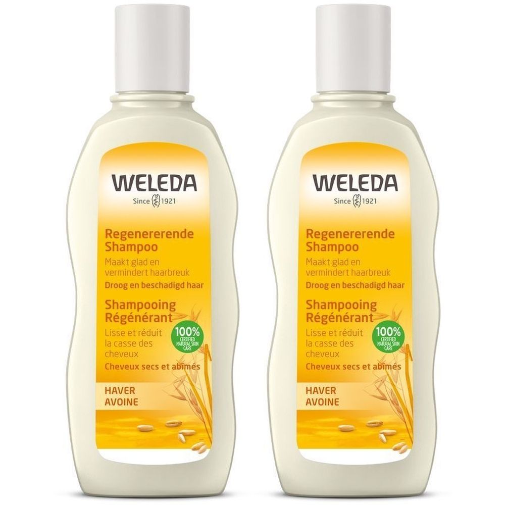 Zwei Flaschen Weleda Hafer Aufbau Shampoo. Beige Flaschen mit weißem Deckel. Gelbes Etikett mit Produktinformationen und Logo.