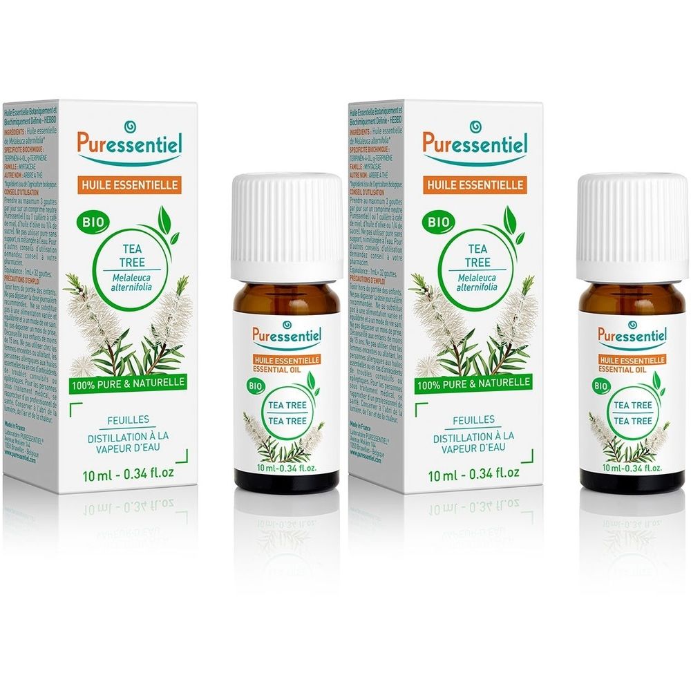 Trois flacons et emballages "Puressentiel Tea Tree". Flacons à bouchon blanc, emballage avec feuilles vertes.