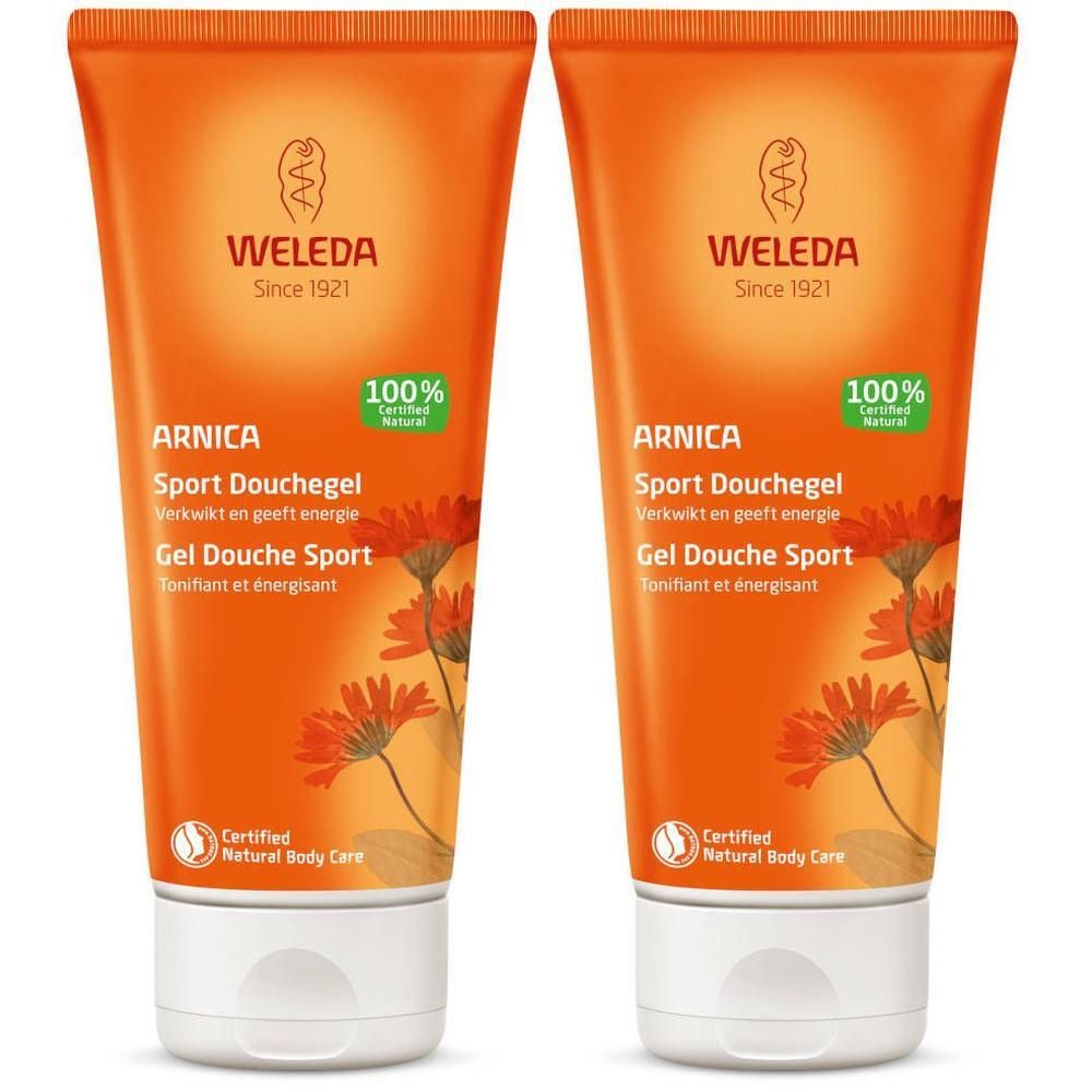 Zwei Tuben Weleda Arnika Sport Duschgel. Orangefarbene Verpackung mit Produktnamen und Logo. Zertifiziertes Naturprodukt.