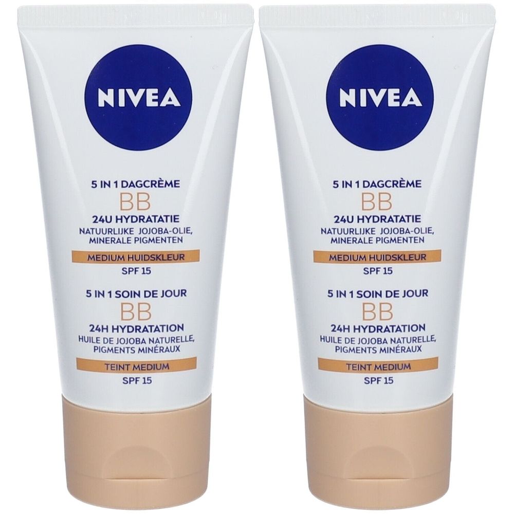 Deux tubes de crème BB NIVEA. Tubes blancs avec logo bleu et informations produit. Bouchon beige. Texte : Medium, SPF 15.