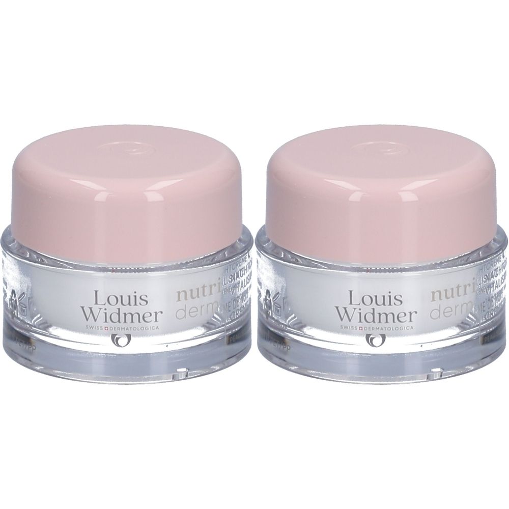 Deux pots de crème de nuit Louis Widmer Nutriderm. Récipients en verre avec couvercles roses. Inscription: Nutriderm, Louis Widmer.