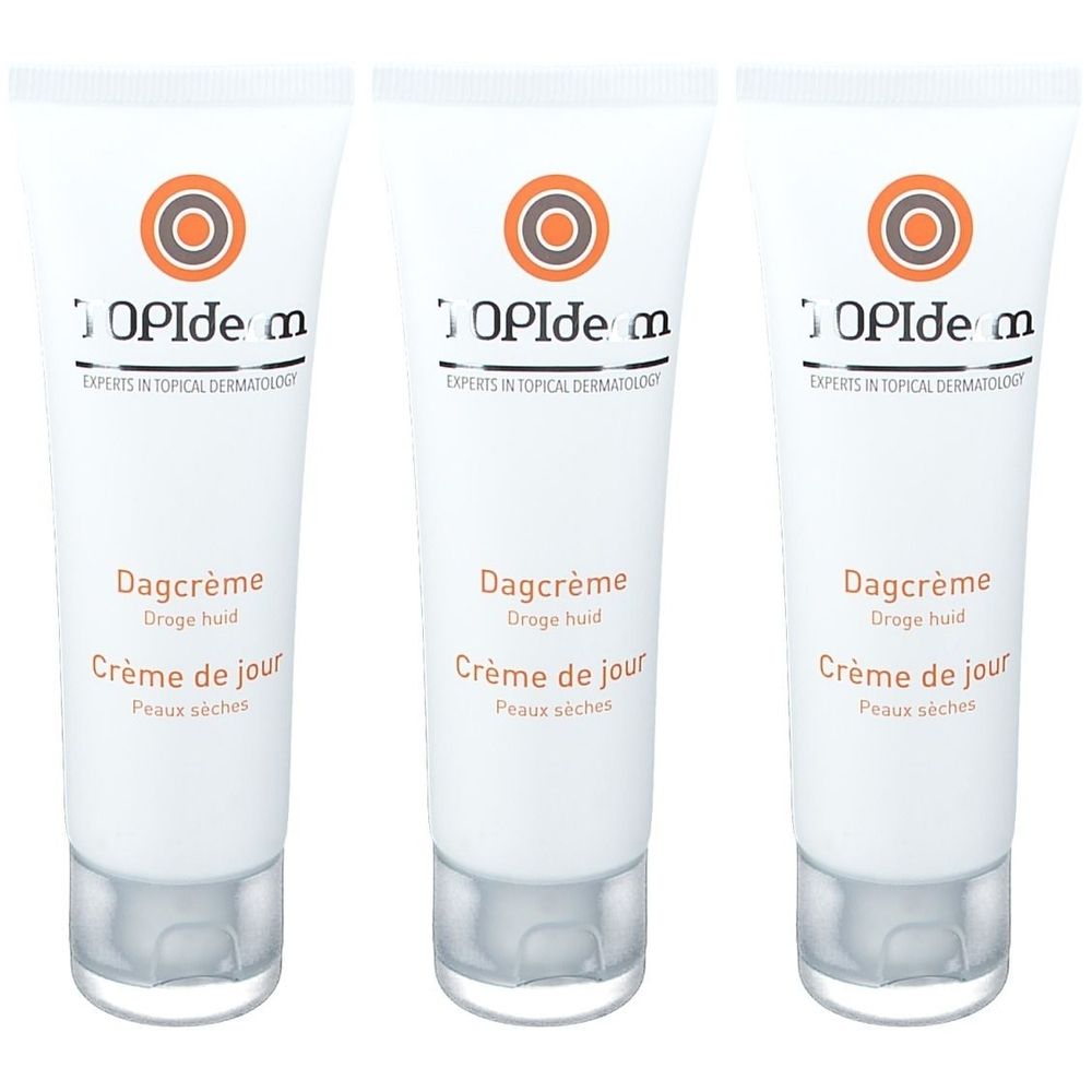 Trois tubes de crème de jour TOPIderm. Tubes blancs avec logo orange et indications en allemand et français.