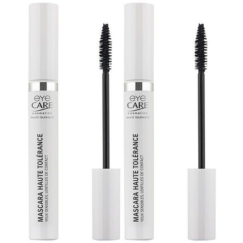 Quatre tubes de mascara, deux fermés, deux avec brosse. Blanc, bague argentée, bouchon blanc. Inscription: Eye Care Cosmetics, Mascara.
