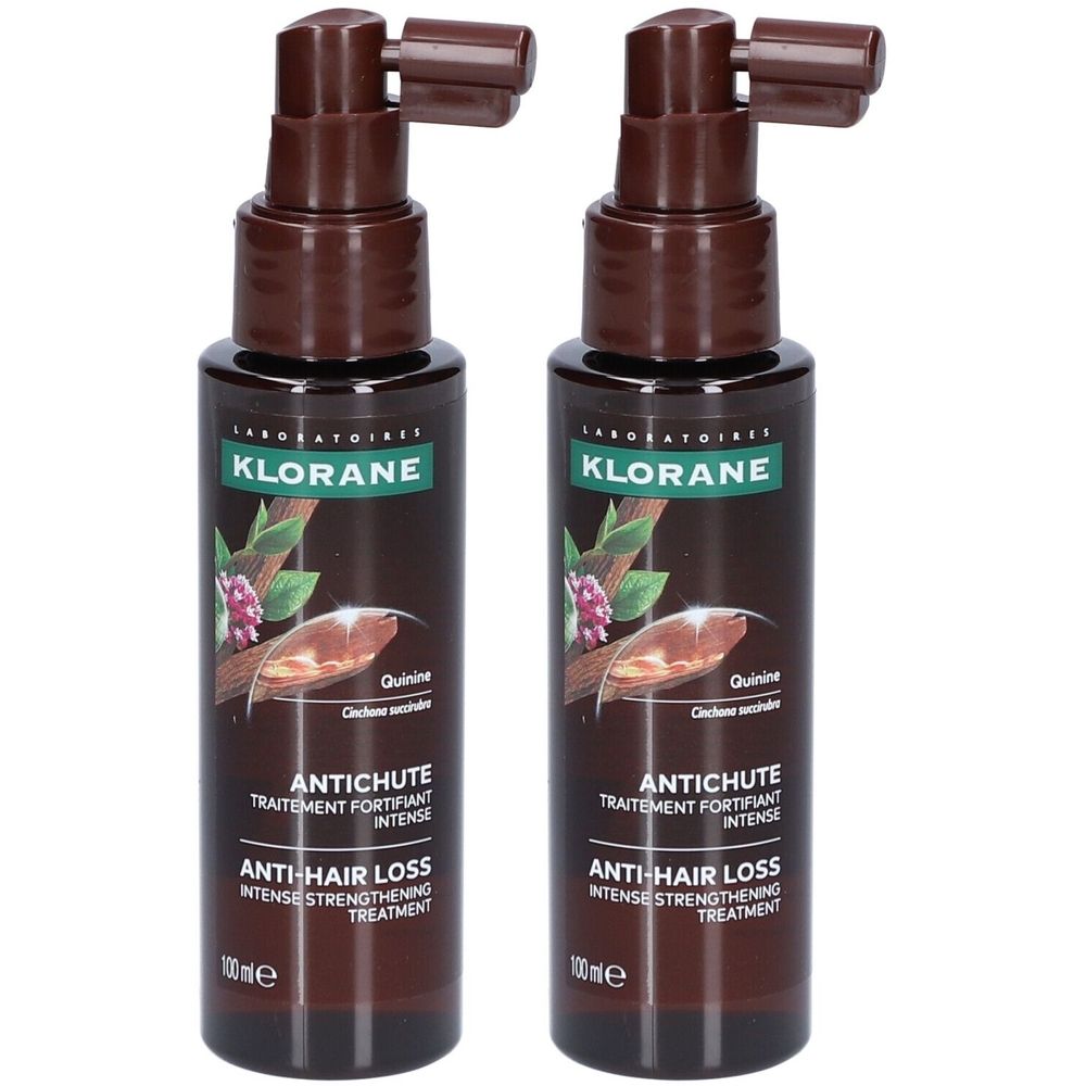 Zwei Flaschen mit braunem Sprühkopf. Aufschrift: Klorane, Antichute, Anti-Haarausfall. Flaschen mit brauner Flüssigkeit.