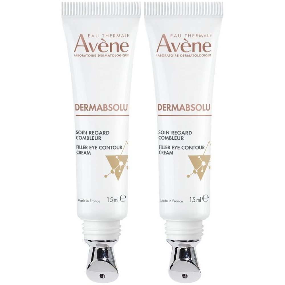 Deux tubes de crème pour les yeux Avène Dermabsolu. Blancs, avec texte et logo. 15ml. Fabriqué en France.