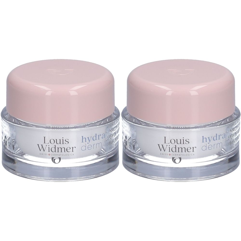 Deux pots de crème de nuit Louis Widmer Hydraderm avec couvercles roses. Récipients en verre avec crème blanche. Inscription sur le devant.