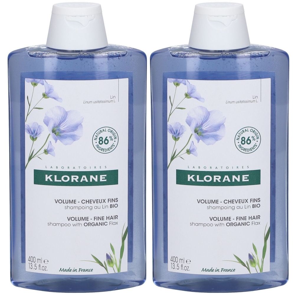 Zwei blaue Shampoo-Flaschen mit weißem Etikett. Aufschrift: KLORANE, VOLUME, Shampoo für feines Haar mit Bio-Leinen. 86% natürliche Inhaltsstoffe.