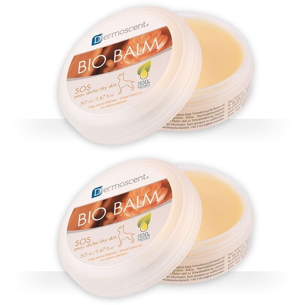 Deux pots ronds ouverts. Sur le couvercle, on lit "BIO BALM" et "SOS". En dessous, un symbole de chien et une feuille.