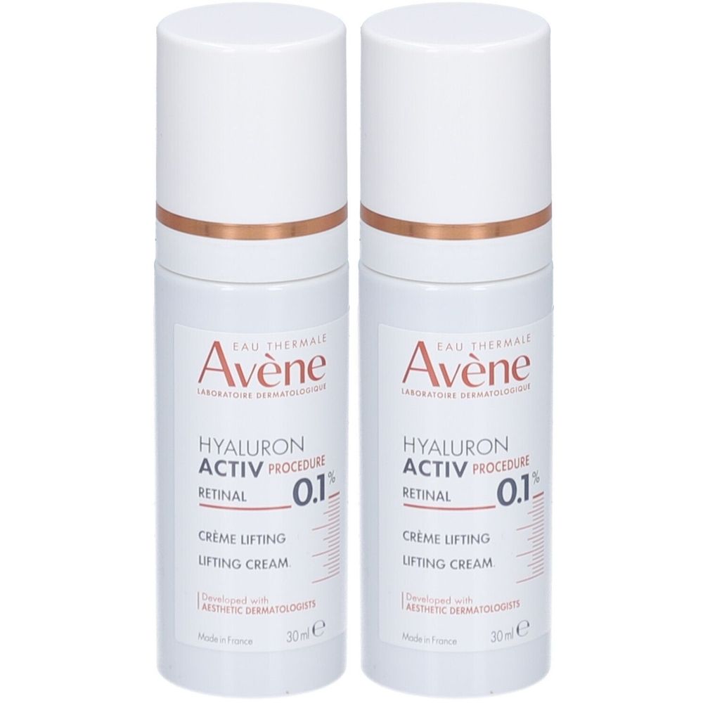 Deux flacons de crème Avène Hyaluron Activ Procedure Retinal 0,1% Crème Lifting Anti-Âge. Flacons blancs, bouchons blancs, anneau cuivré.