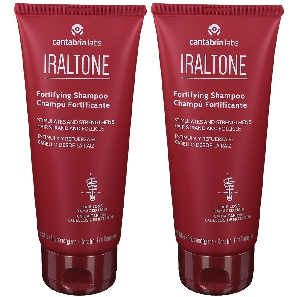 Deux tubes rouges de shampooing IRALTONE. Texte: Fortifying Shampoo, Stimulates and Strengthens Hair Strand and Follicle.