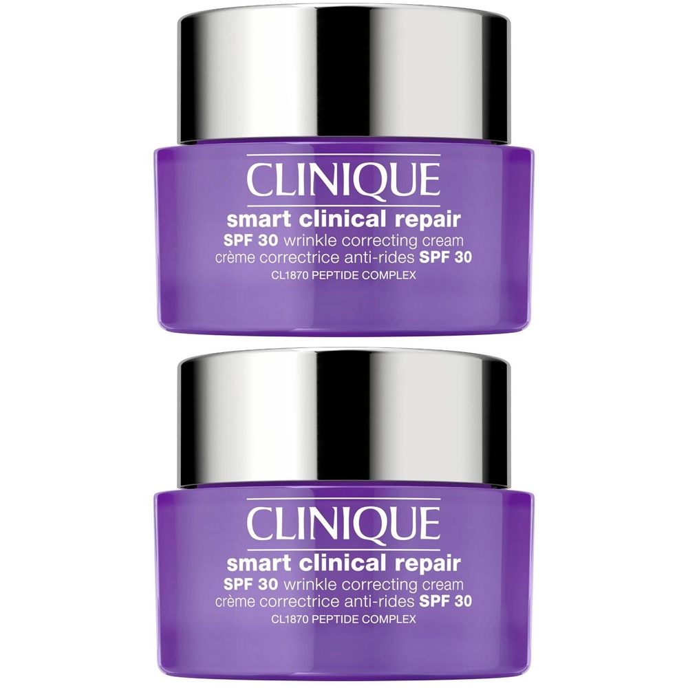 Deux crèmes anti-rides Clinique Smart Clinical Repair dans des pots violets avec des couvercles argentés.