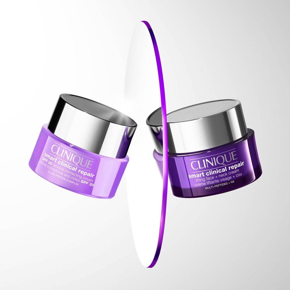 Zwei violette Tiegel Clinique Smart Clinical Repair Creme, einer mit LSF 30.