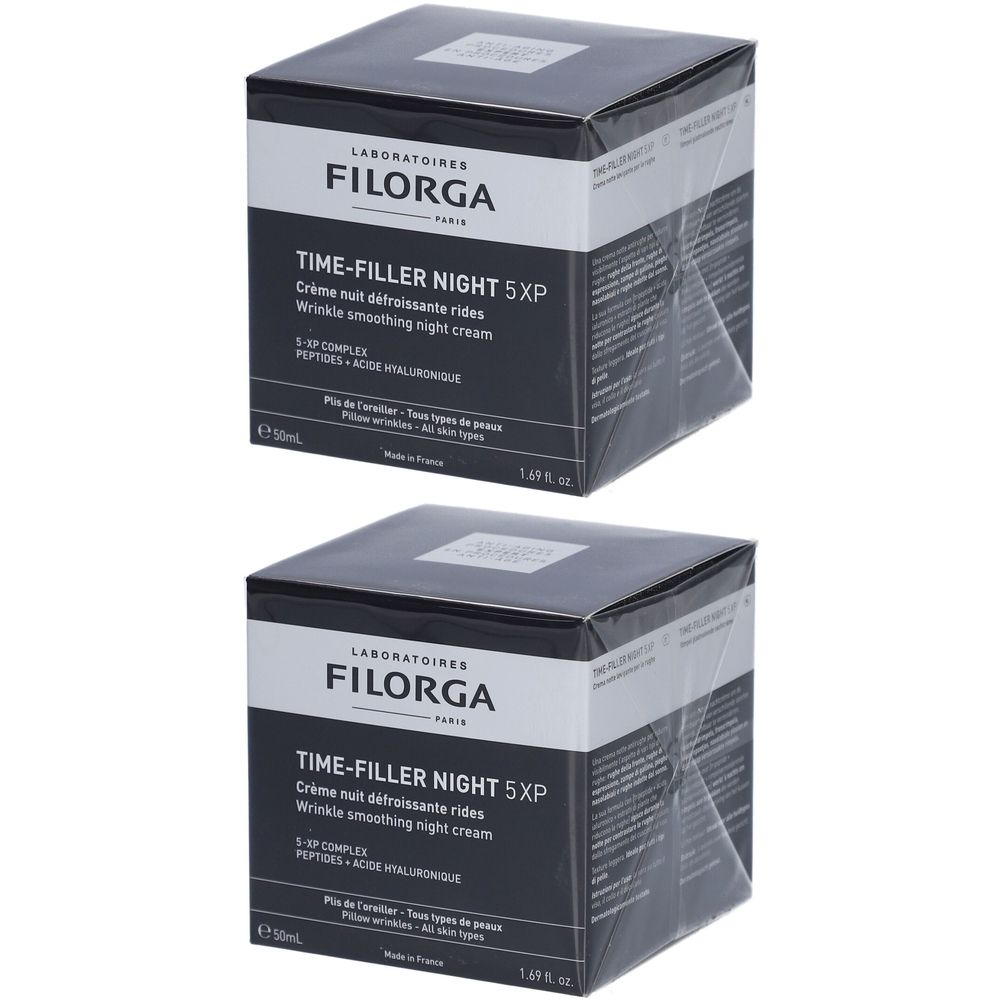 Zwei Filorga Time-Filler Night 5XP Falten glättende Nachtcreme-Verpackungen. Schwarze quadratische Schachteln mit weißer Schrift.