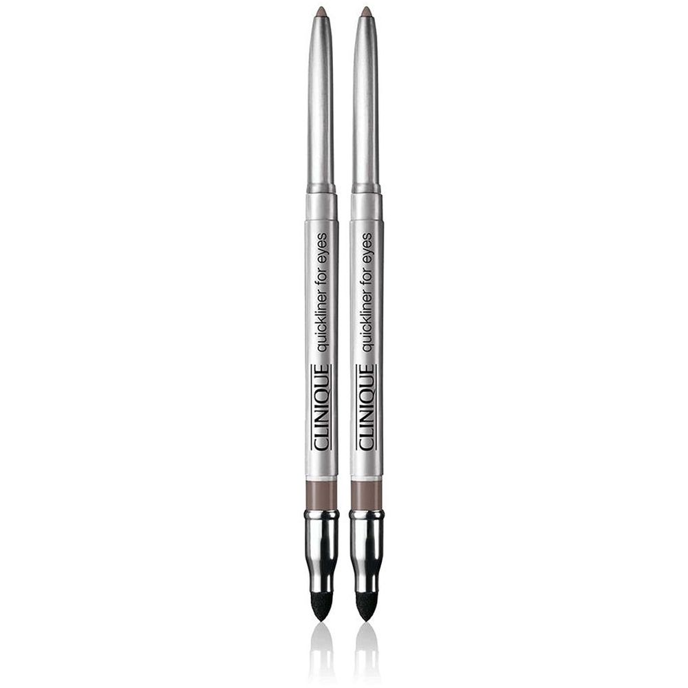 Deux crayons pour les yeux argentés. Inscription: CLINIQUE quickliner for eyes. Pointe noire, mine marron.