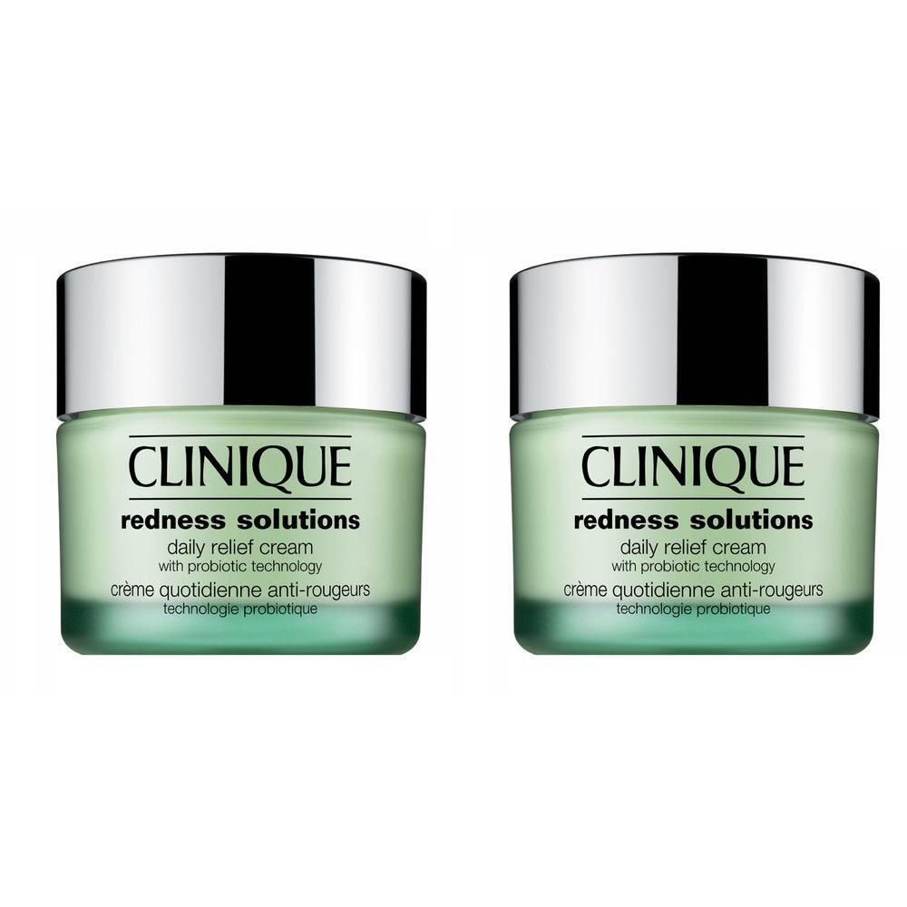 Zwei grüne Tiegel mit silbernen Deckeln. Aufschrift: Clinique, Redness Solutions, Daily Relief Cream, Technologie probiotique.