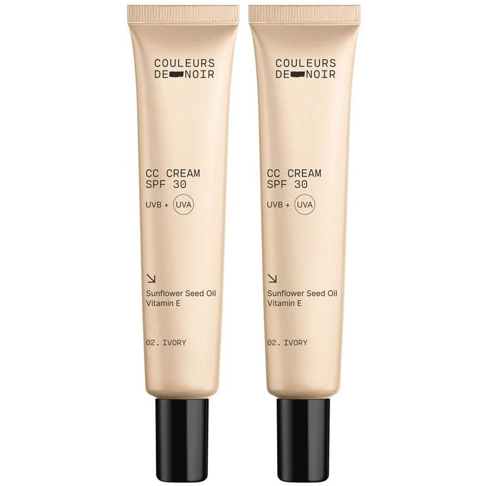 Deux tubes de Couleurs de Noir CC CREAM SPF30 02 Ivory. Tubes beiges avec bouchons noirs. Texte: CC CREAM, SPF 30, UVB + UVA.