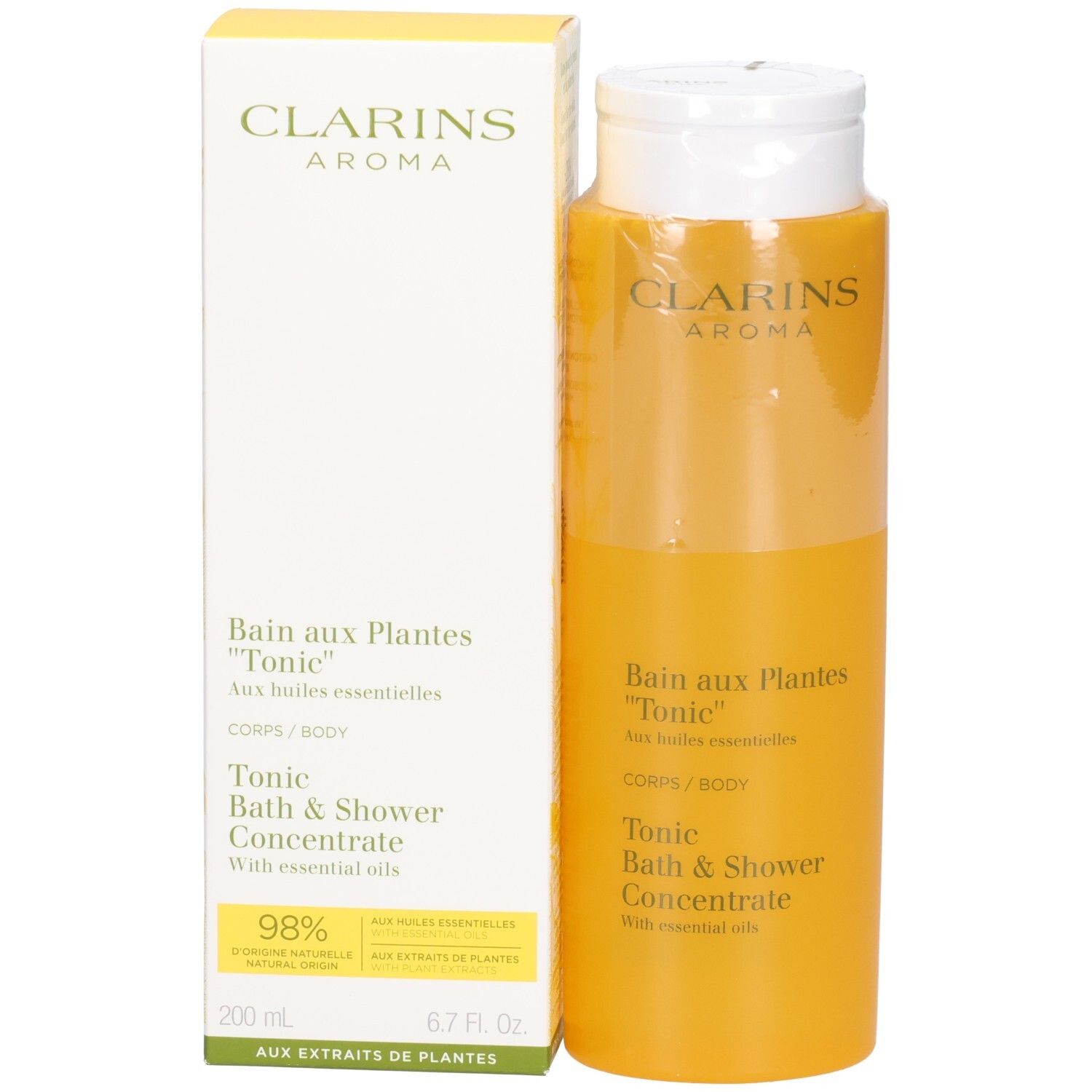 Clarins Tonic Bad & Duschkonzentrat und seine Verpackungsschachtel, beide gelb.