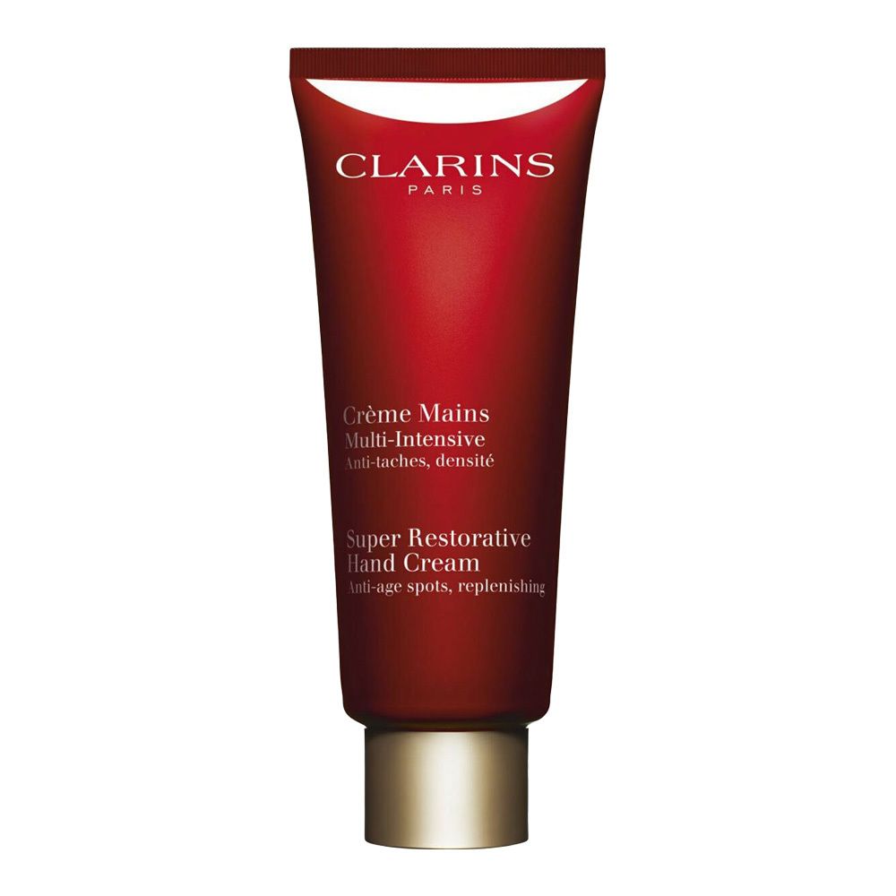 Tube rouge de crème pour les mains Clarins avec bouchon argenté. Étiquette avant avec nom du produit.