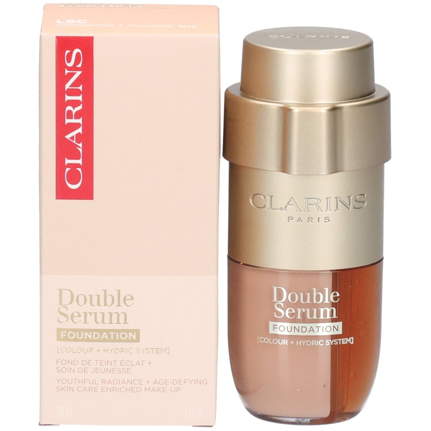 Clarins Double Serum Foundation Flakon und Umverpackung. Flakon mit goldfarbenem Pumpspender.