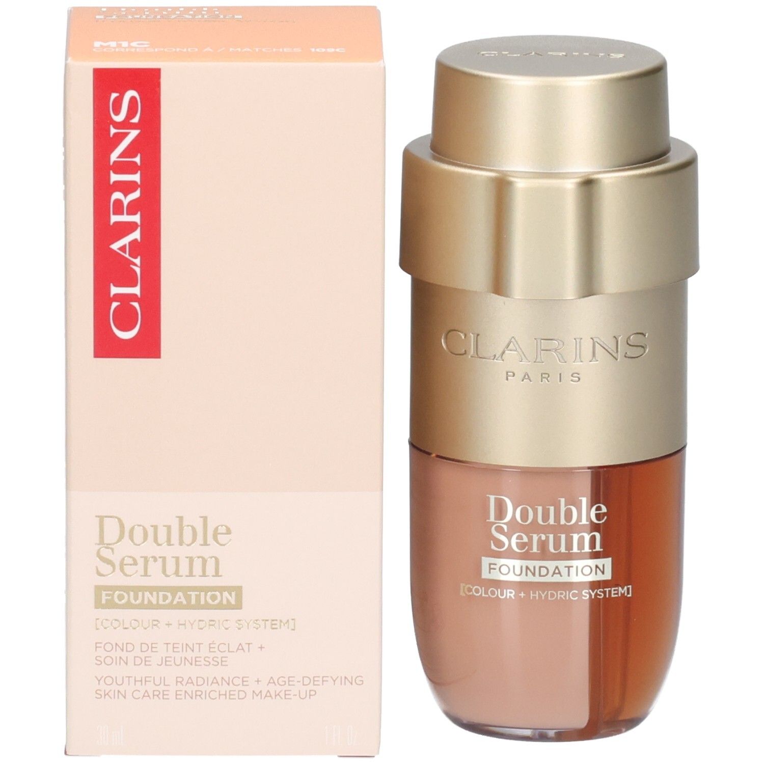 Clarins Double Serum Foundation M1C und Verpackung. Goldene Pumpe, Flasche mit zwei Kammern, Karton.