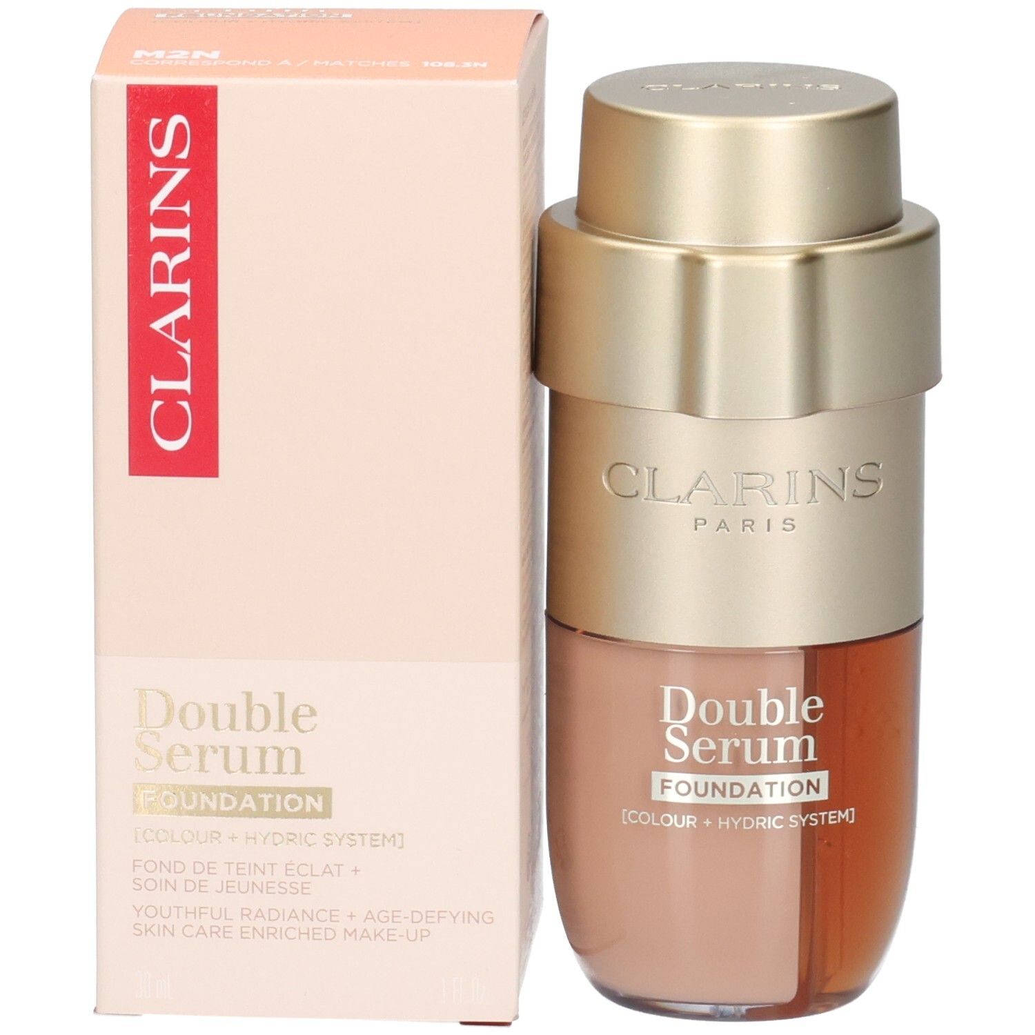 Clarins Double Serum Foundation M2N: Goldfarbener Pumpspender mit zwei Kammern, eine mit beiger Foundation, die andere mit goldbraunem Serum.