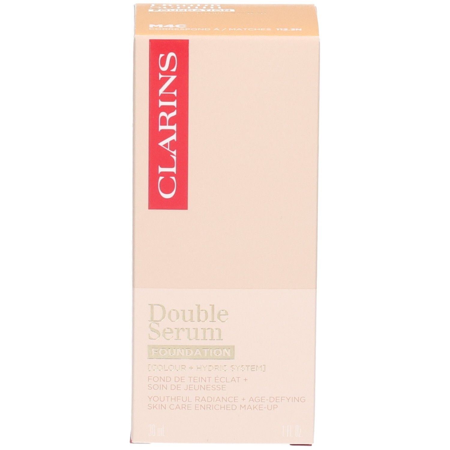 Clarins Double Serum Foundation M4C und Verpackung. Goldfarbener Pumpspender mit zwei Kammern, eine für die Foundation, eine für das Serum.