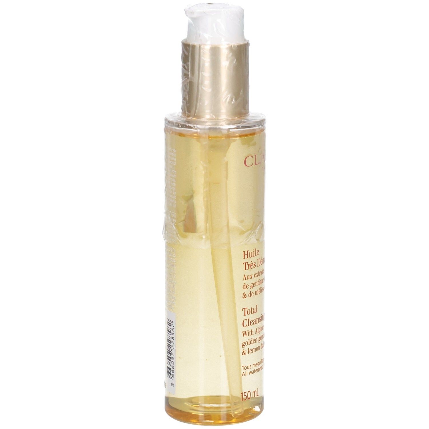 Clarins Total Cleansing Oil Flasche von der Seite, goldfarbener Verschluss.