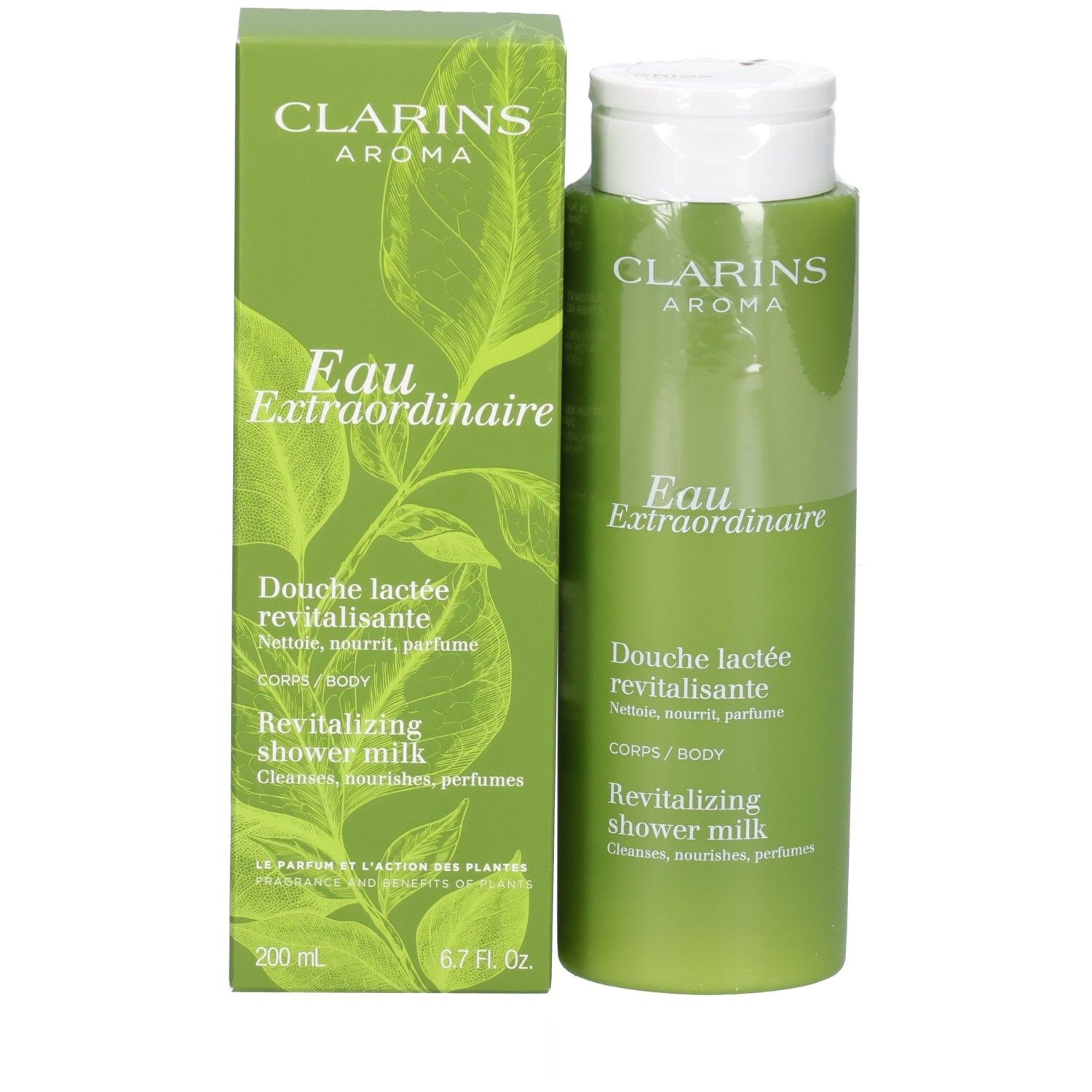 Bouteille de lait de douche Clarins et son emballage extérieur avec motif de feuilles, couleurs vertes.