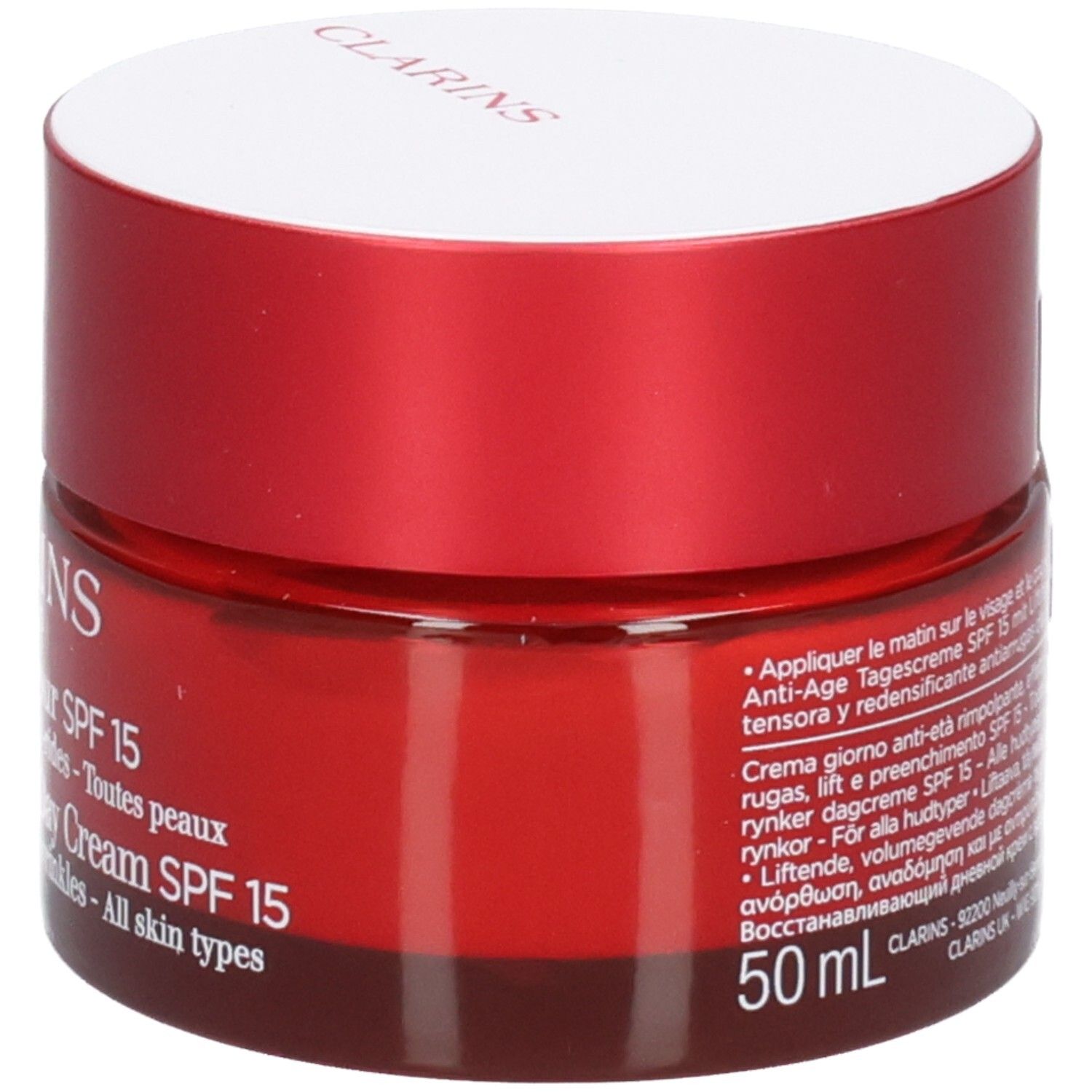 Clarins Multi-Intensive Jour SPF 15 crème, pot rouge avec couvercle et texte produit.