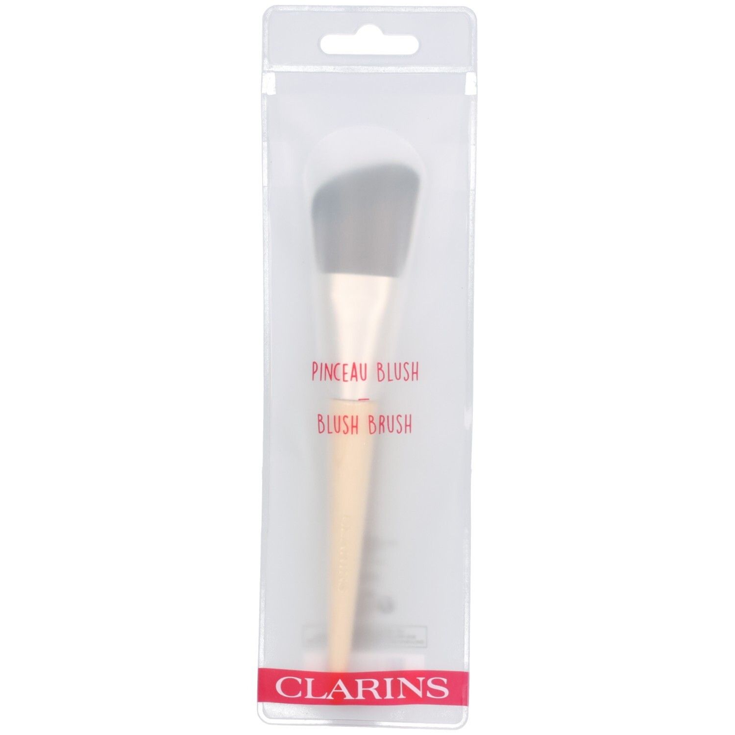Clarins Pinceau Fond de Teint Multi-usage, Make-up Pinsel mit hellem Holzgriff und dunklen Borsten, in transparenter Verpackung.