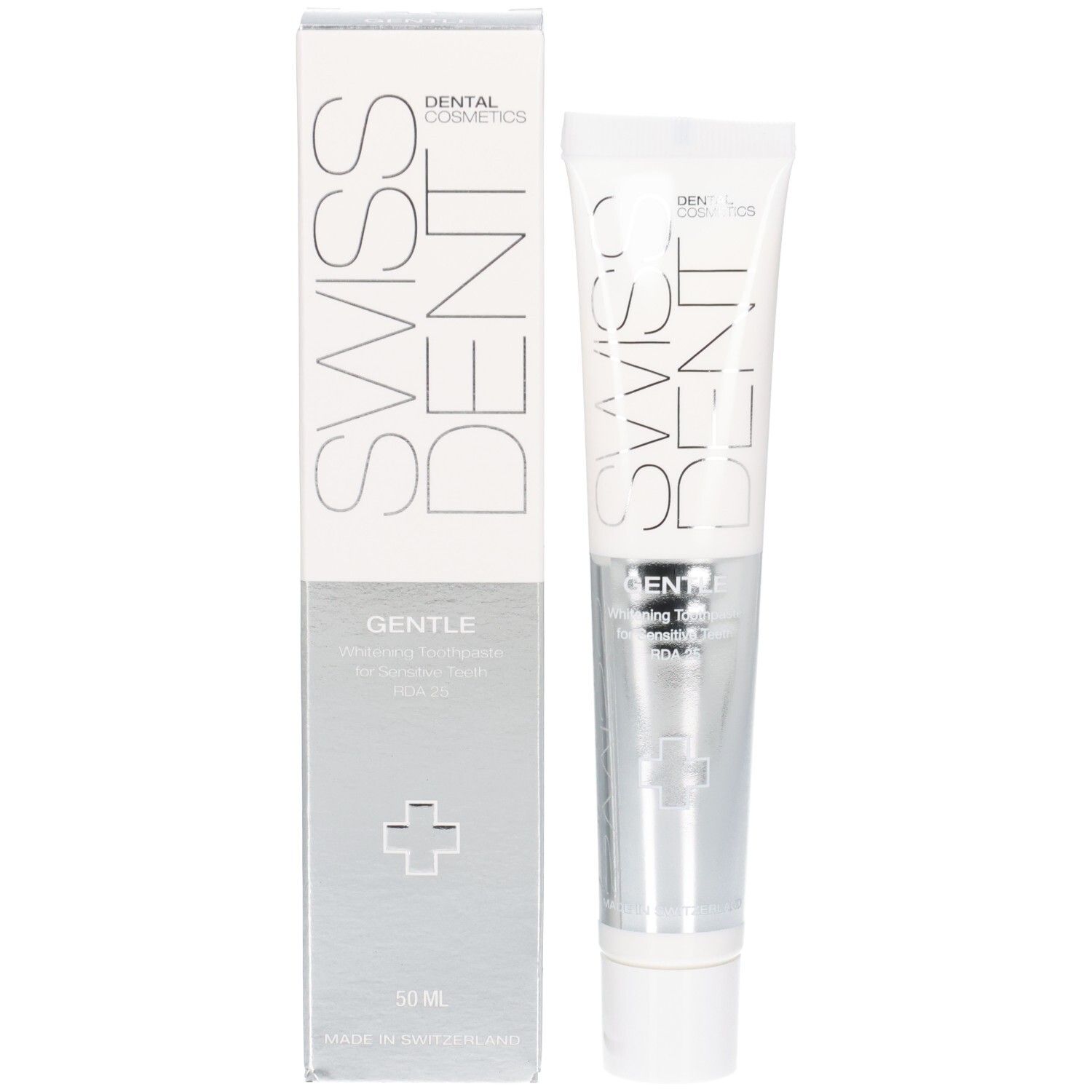 Zahncreme und Verpackung. Aufschrift: SWISSDENT, GENTLE. Silberfarbenes Design. Kreuz-Symbol. 50 ml.