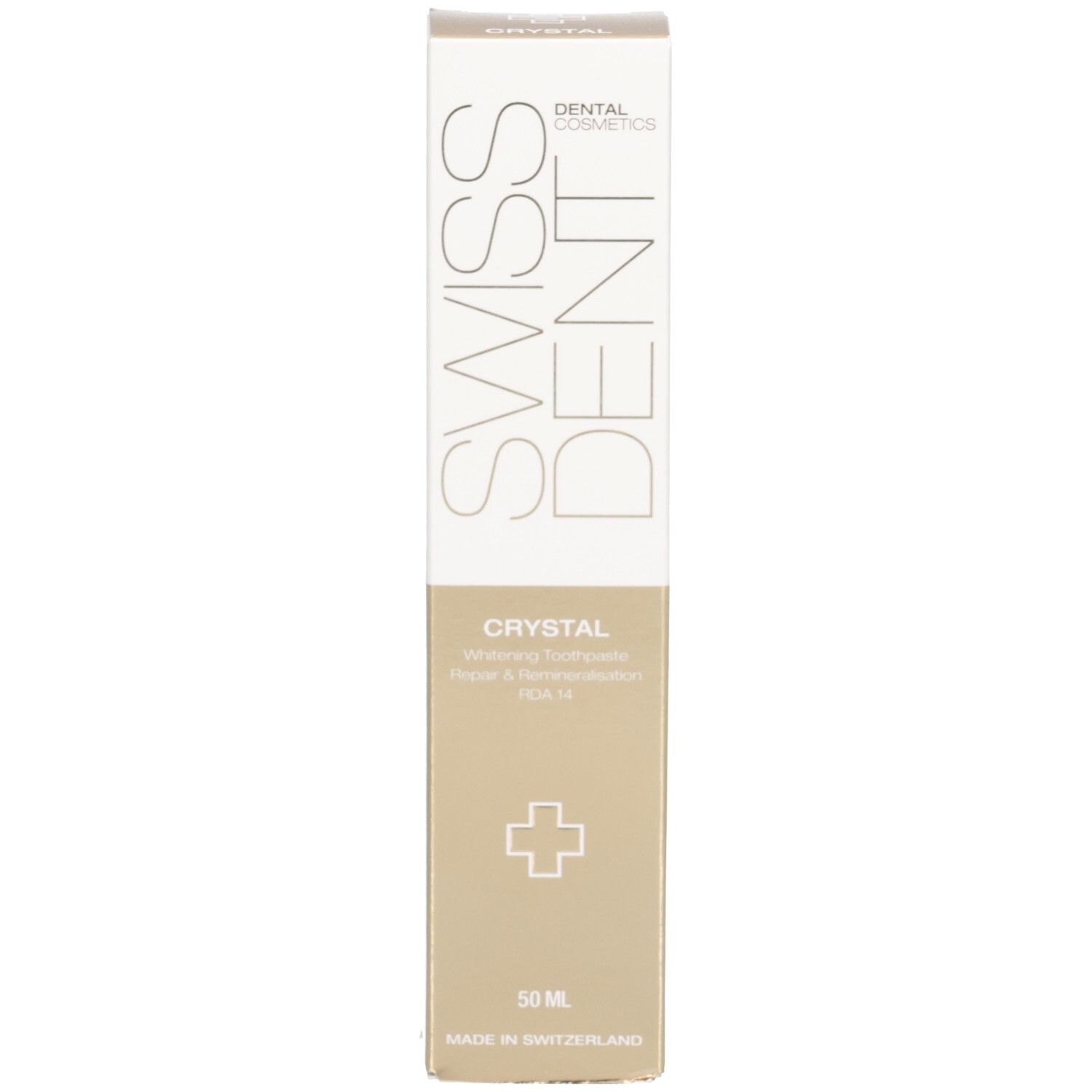 Zahncreme-Schachtel. Aufschrift SWISSDENT CRYSTAL. Goldfarbener Bereich mit weißem Kreuz. 50 ml. Vertikale Ausrichtung.
