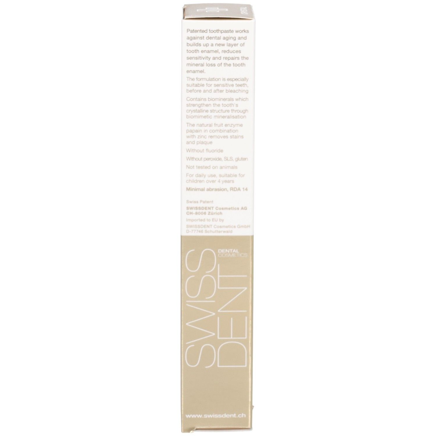 Rückseite der Zahncreme-Schachtel. Text in mehreren Sprachen. Goldfarbener Bereich. Vertikale Ausrichtung.