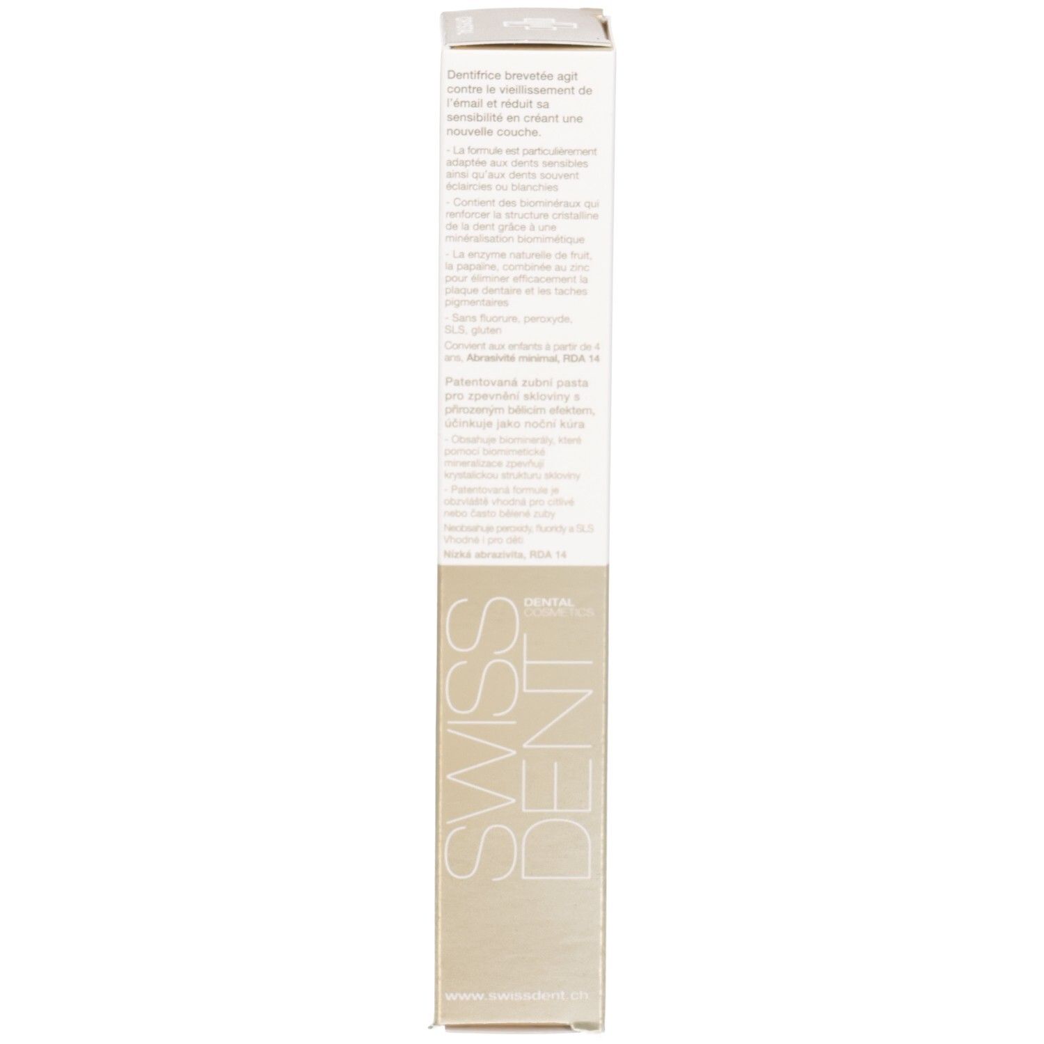 Seite der Zahncreme-Schachtel. Text in mehreren Sprachen. Goldfarbener Bereich. Vertikale Ausrichtung.