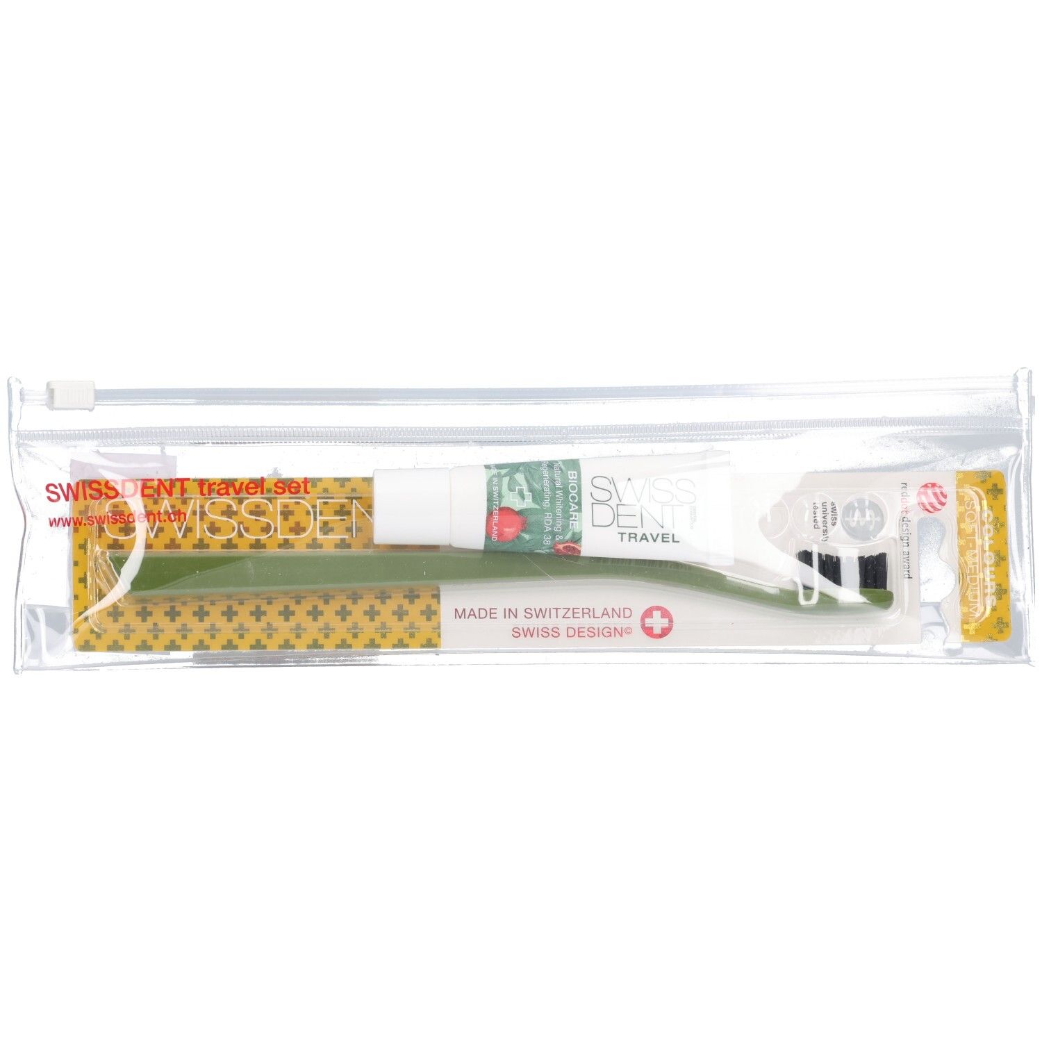 Zahnpasta, grüne Zahnbürste, Reise-Set in transparenter Tasche. Aufdruck: SWISSDENT TRAVEL, Swiss Design, Made in Switzerland.