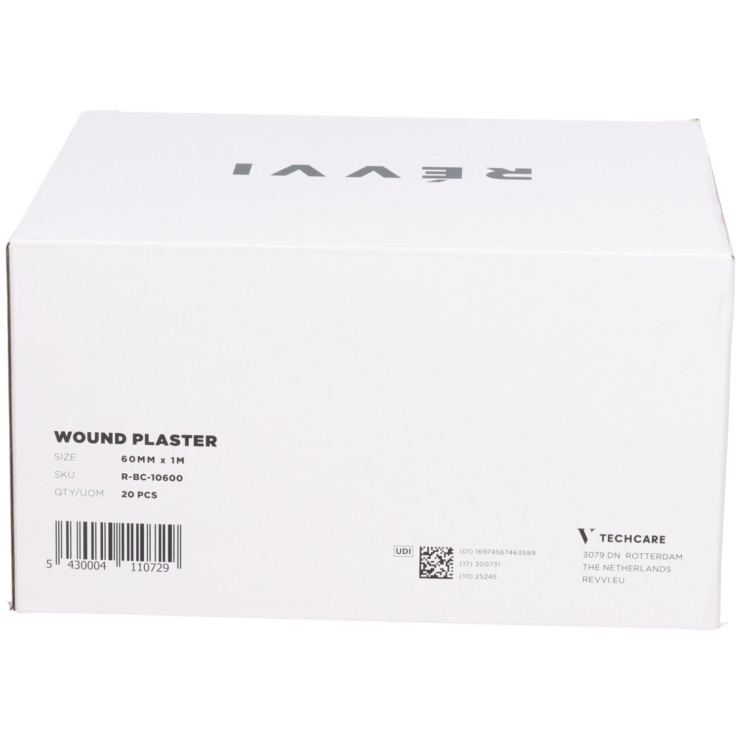 Weiße Schachtel mit Aufschrift WOUND PLASTER, 20 Stück, 60mm x 1M. Auf der Seite: Techcare, RÉVVI EU.