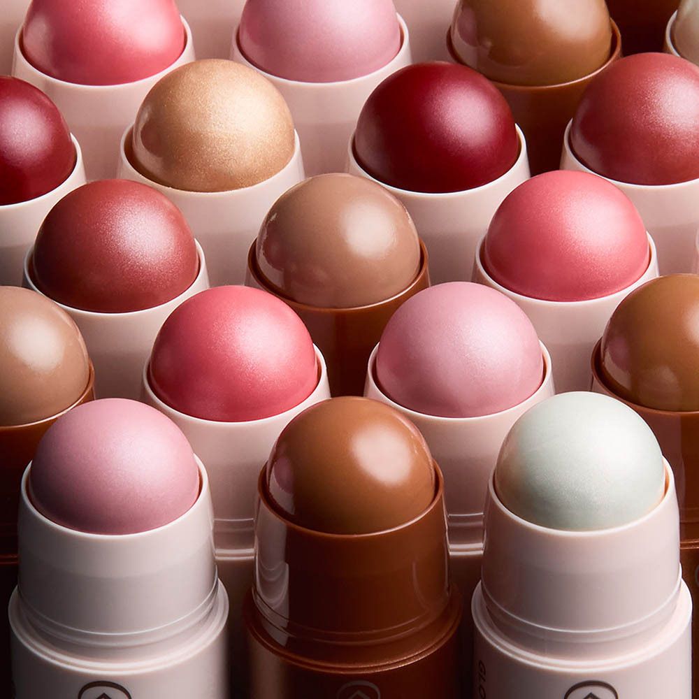 Collistar Twist Velvet Bronzer Stick sur fond sombre.
