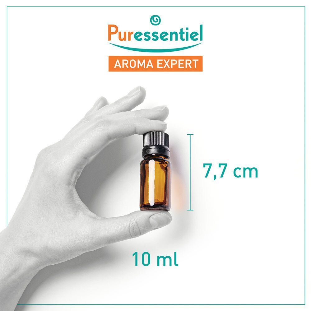 Main tenant une huile essentielle Puressentiel Lavande Bio, 10ml, 7,7cm.