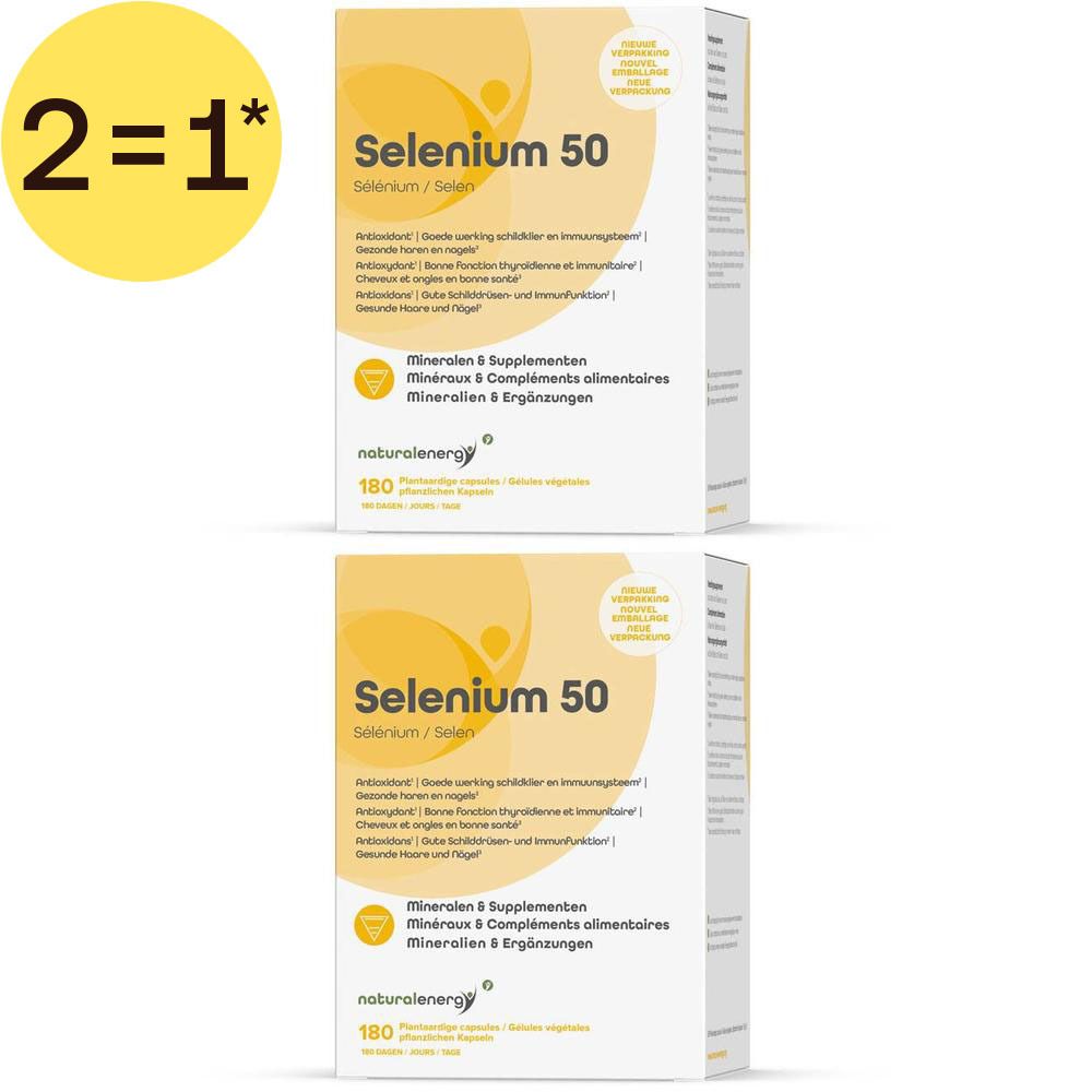 Deux boîtes de "Natural Energy Selenium 50" compléments alimentaires. Boîtes blanches avec cercles jaunes et informations produit.