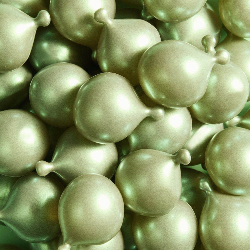 Récipient avec des capsules vertes et le nom de la marque Collistar.
