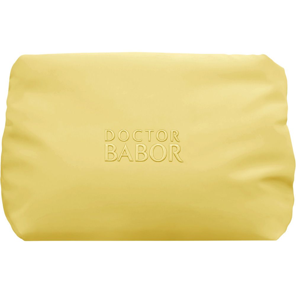 Coffret cosmétique Babor avec deux tubes de crème, ampoules et pochette jaune.